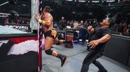 Jeff Cobb acquainting LA Knight to the ring post. (Image credits: wwe.com)